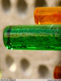 Statue - detail - green and amber glass